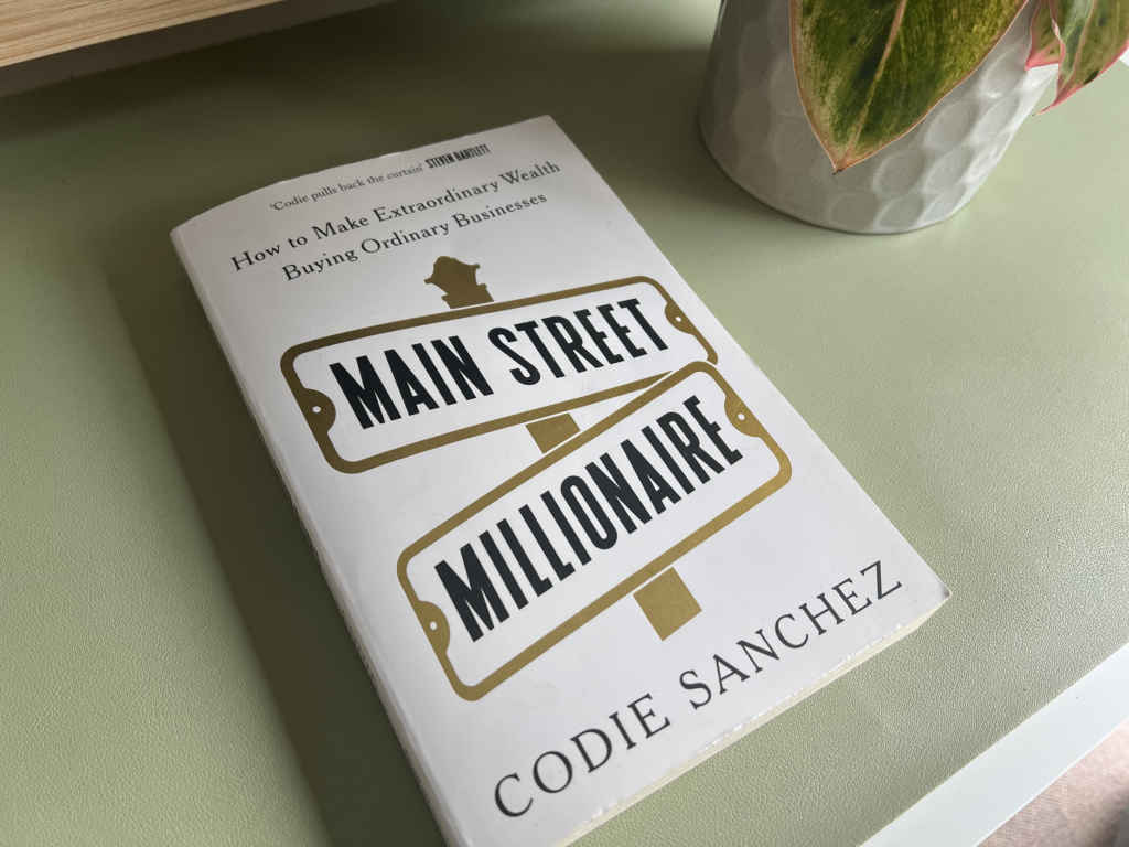 Book cover of "Main Street Millionaire" by Codie Sanchez.